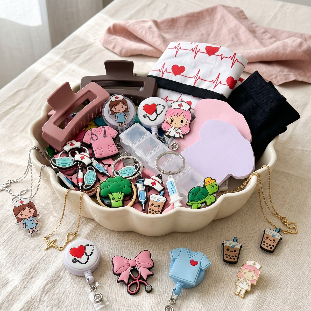 Mia's Nurse Scoop: a scalloped dish heaped with badge reels, stethoscope necklaces, pins and clog charms