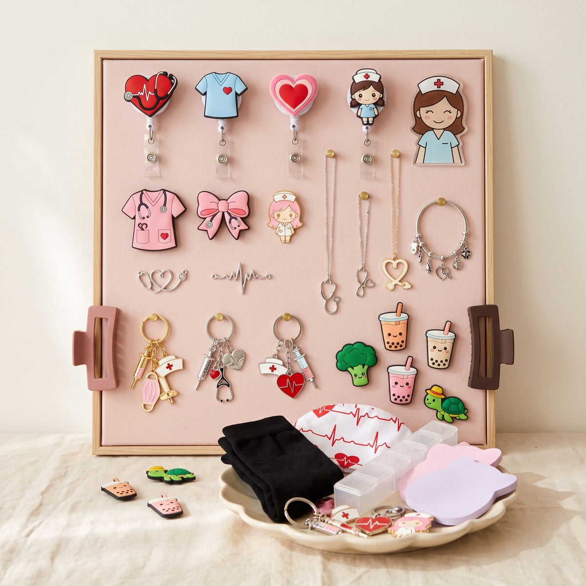 My nurse board, a little wall of badge reels, pins, necklaces and charms